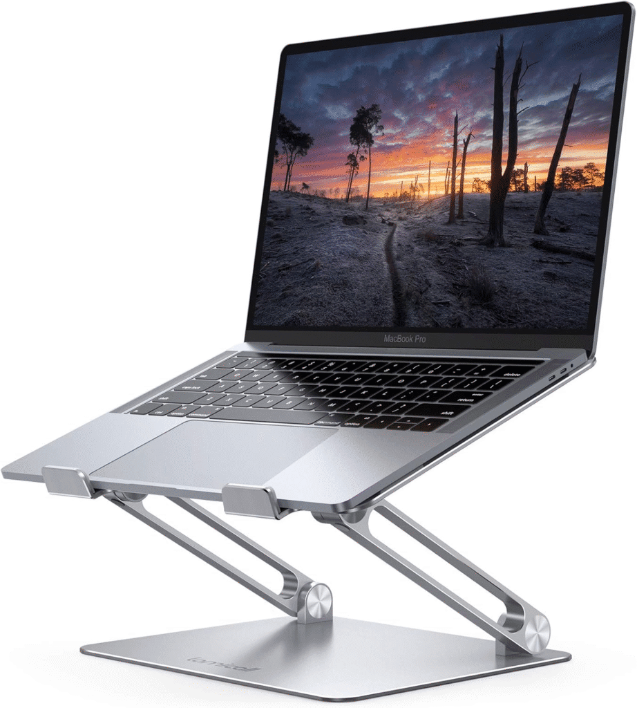 An adjustable laptop stand on a desk, elevating a laptop screen to eye level for better posture and comfort.