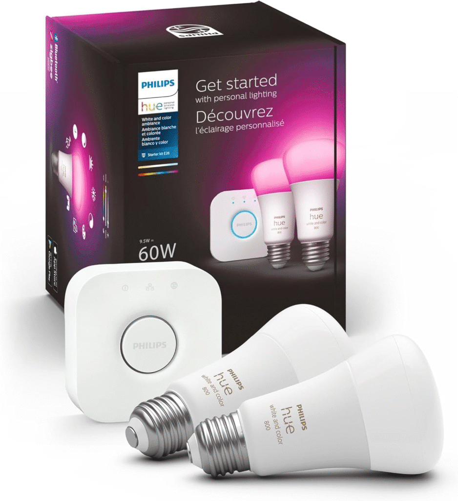 Philips Hue white and color ambiance bulbs and hub, shown in a modern home office lighting setup.